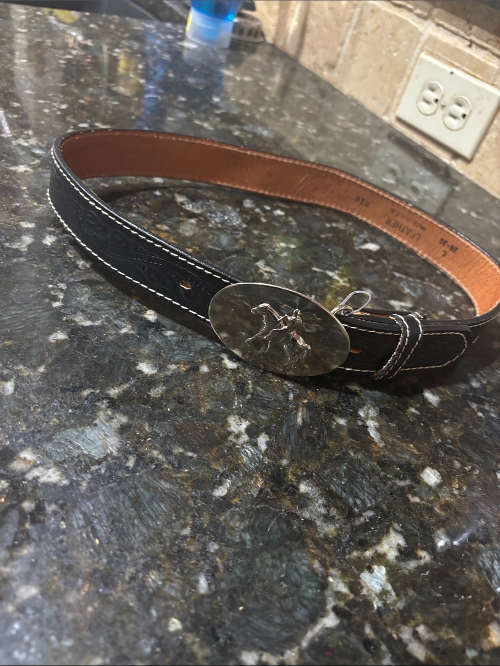 Western leather belt and silver buckle